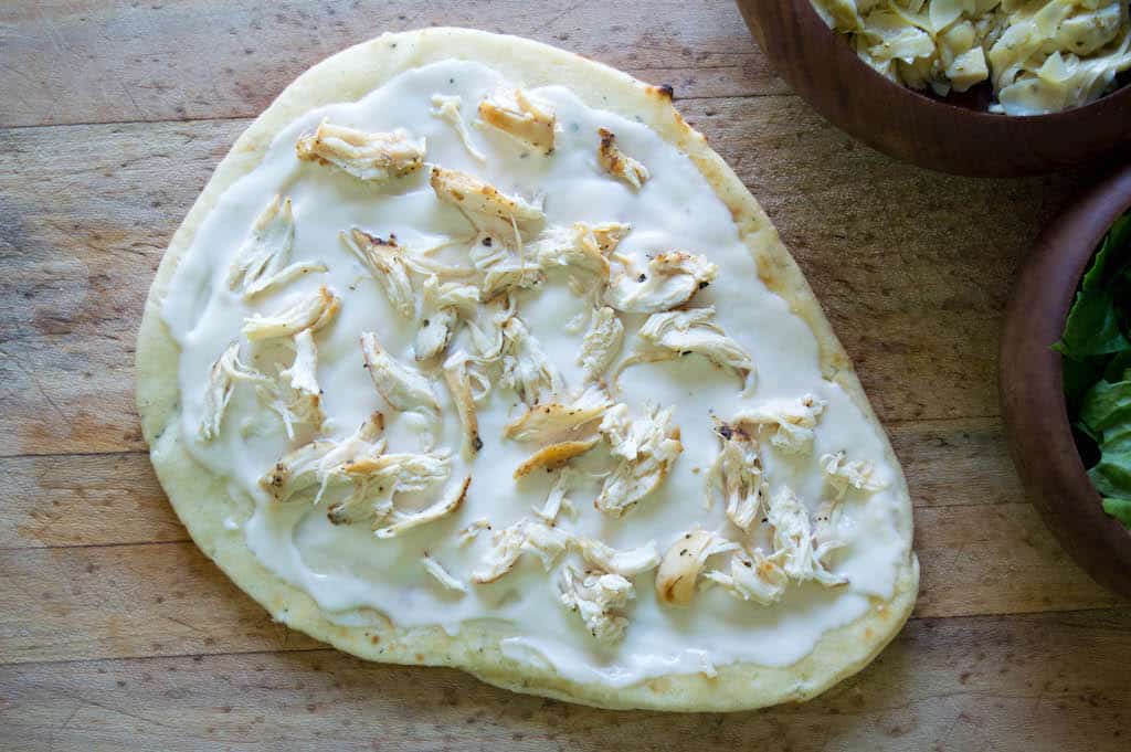 The Alfredo Chicken Mozzarella Flatbread Pizza is easy and everyone's favorite that is satisfying that can be made in a hurry with rotisserie chicken.