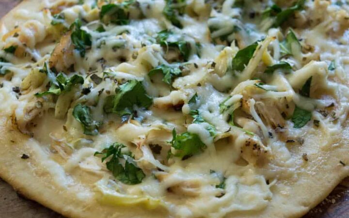 The Alfredo Chicken Mozzarella Flatbread Pizza is easy and everyone's favorite that is satisfying that can be made in a hurry with rotisserie chicken.