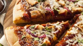 A delicious and easy BBQ Chicken Pizza recipe that can also be made with a cauliflower pizza crust and rotisserie chicken along with your favorite Memphis BBQ sauce. 
