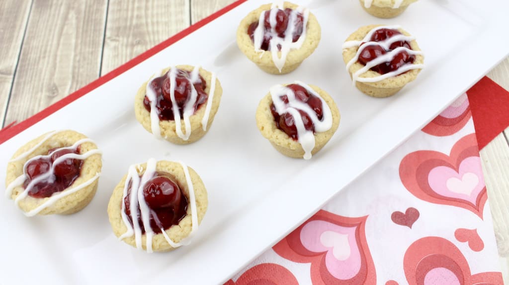The Cherry Pie Cookie Cups recipe is my favorite cherry recipe. Cherry Pie Cookies are like mini cherry pies. Cherry sugar cookie cups are filled with cherry pie filling. 