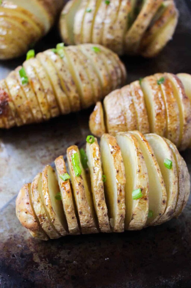 The Hasselback Potatoes Recipe is the perfect addition to any meal. A delicious buttery potato seasoned just right. Add cheese and sour cream to top it off.