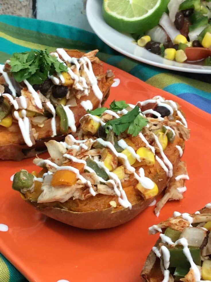 Mexican Stuffed Sweet Potato are loaded with fiber and vitamin A, but low in fat and calories. Made with rotisserie chicken stuffed sweet potatoes makes for a fast and easy baked sweet potato recipe.