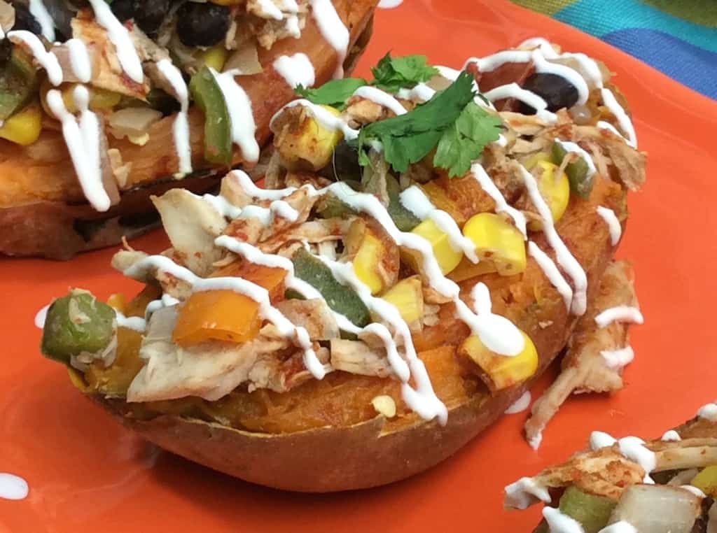 Mexican Stuffed Sweet Potato are loaded with fiber and vitamin A, but low in fat and calories. Made with rotisserie chicken stuffed sweet potatoes makes for a fast and easy baked sweet potato recipe.