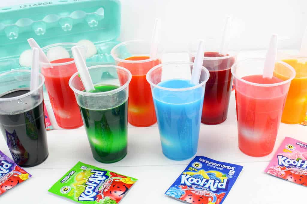 eggs sitting in kool-aid cups