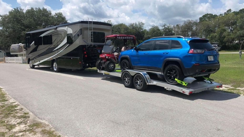 rv with car trailer