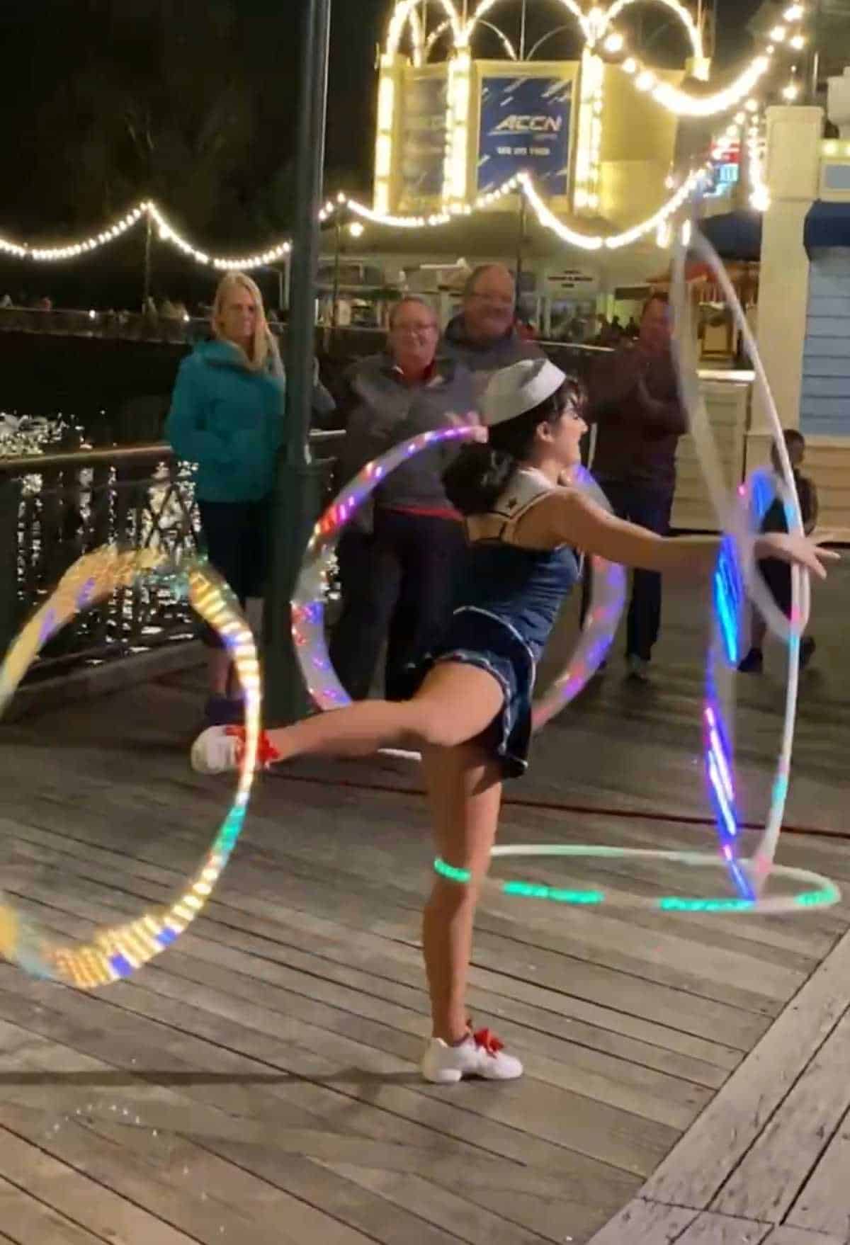 girl with multiple hula hoops at disney springs