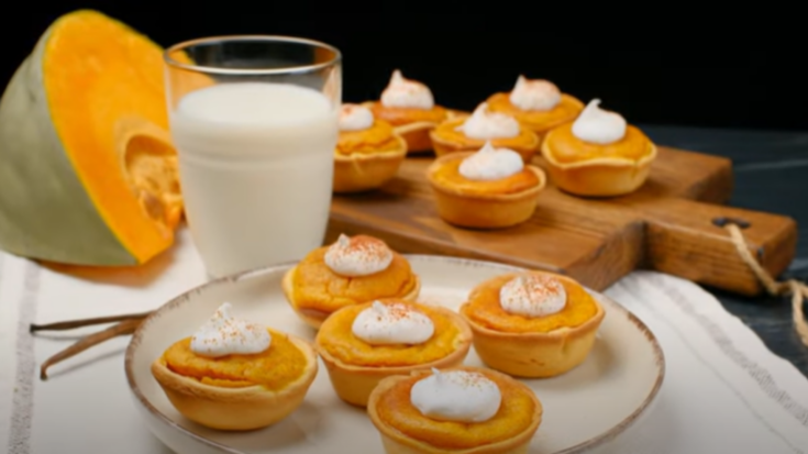 pumpkin pie bites on a table with milk