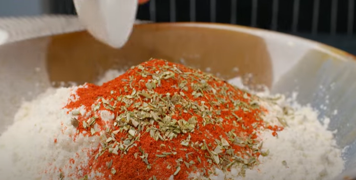 spices in a bowl with flour for the 13 spices in kfc